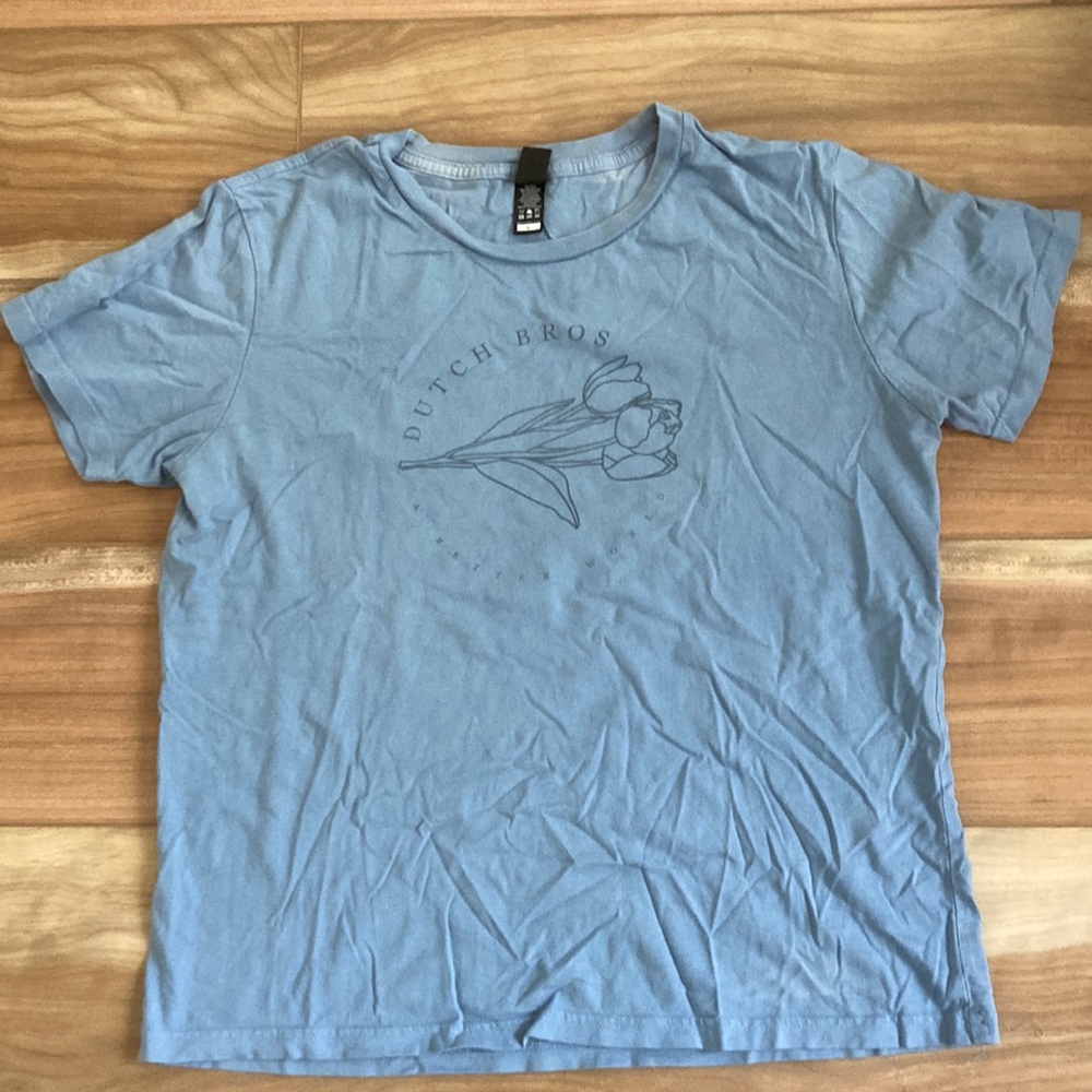 Relaxed fit blue dutch wear tee. “A better world”